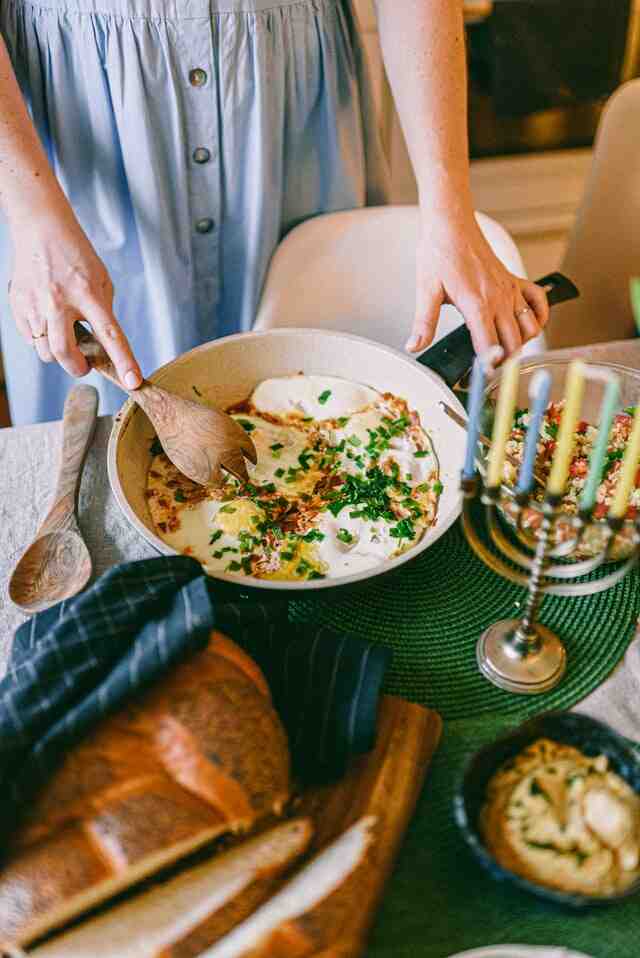 Turkish Menemen served with Bread and yogurt cucumber dip