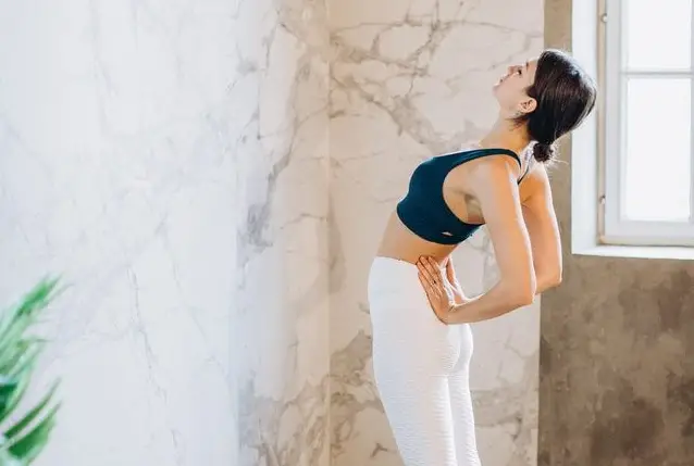 Stretching with yoga pants in the morning.