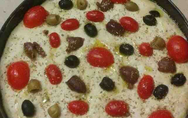 Vegan Focaccia Italian Bread Barese with tomatoes and olives