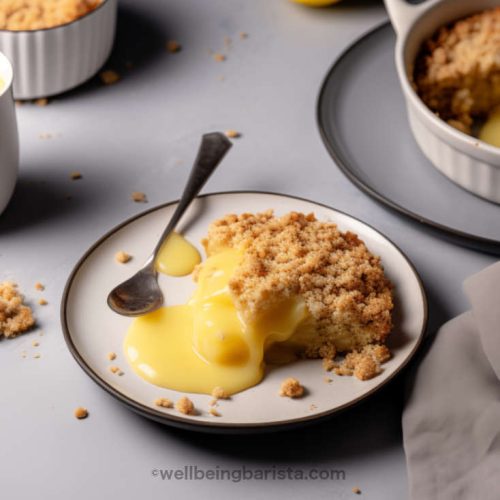 apple crumble served on a plate with lemon curd