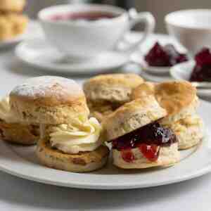 paul hollywood classic scones served with clotted cream and jam