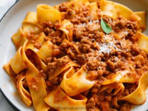 Pappardelle ragu alla bolognese served on a plate