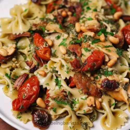 farfalle in a creamy chicken sauce adorned with sun-dried tomatoes, mushrooms and toasted pine nuts.