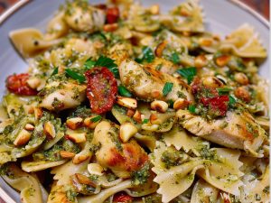 Pesto Chicken Bow Tie Pasta with Pine Nuts and Sun Dried Tomatoes
