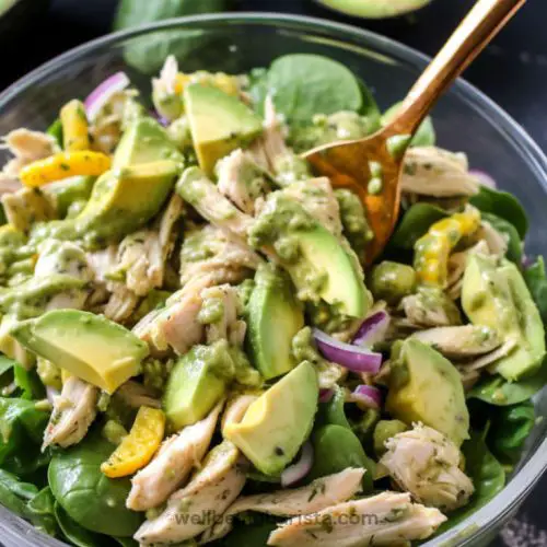 Grilled chicked and Avocado Salad with baby spinach and rocket leaves.