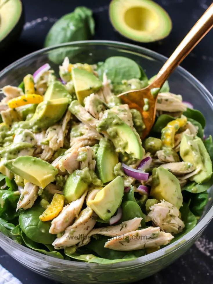 Grilled chicked and Avocado Salad with baby spinach and rocket leaves.