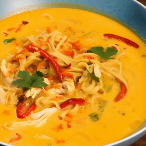 Thai Creamy Chicken Noodle Soup With Carrots, Ramen Noodles, Red Capiscum and Coconut Milk