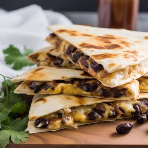 vegetarian cheesy breakfast quesadilla with black beans